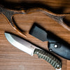SPIKA BUSHMASTER DOGTOOTH WITH CARVED PAKKAWOOD HANDLE AND SHEATH